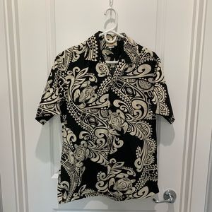 Hawaiian style button up shirt.